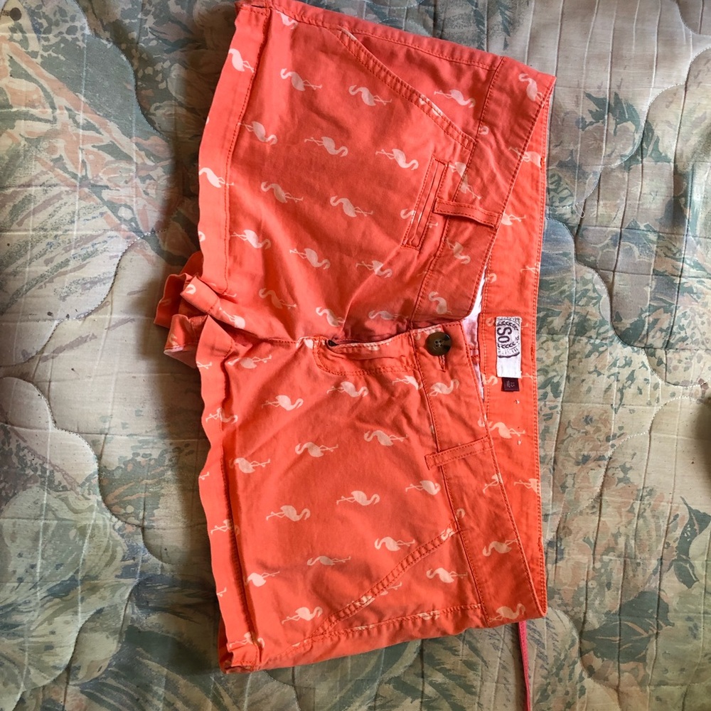 Light orange shorts with flamingos